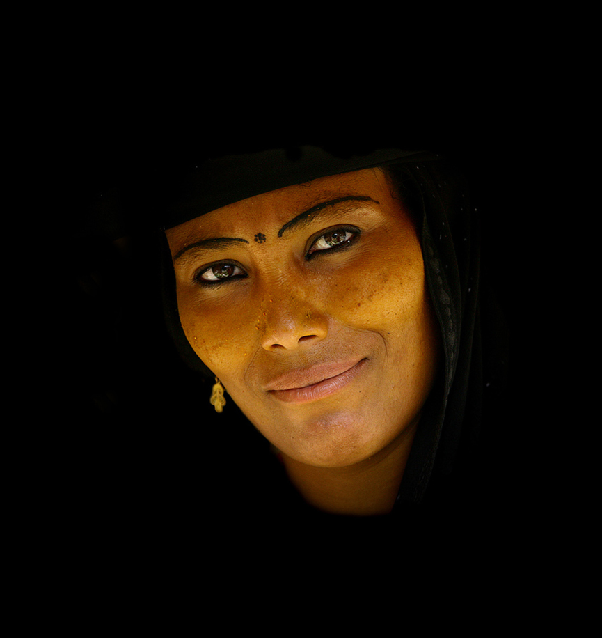 Mujer enseña su rostro en Yemen. Eric Lafforgue