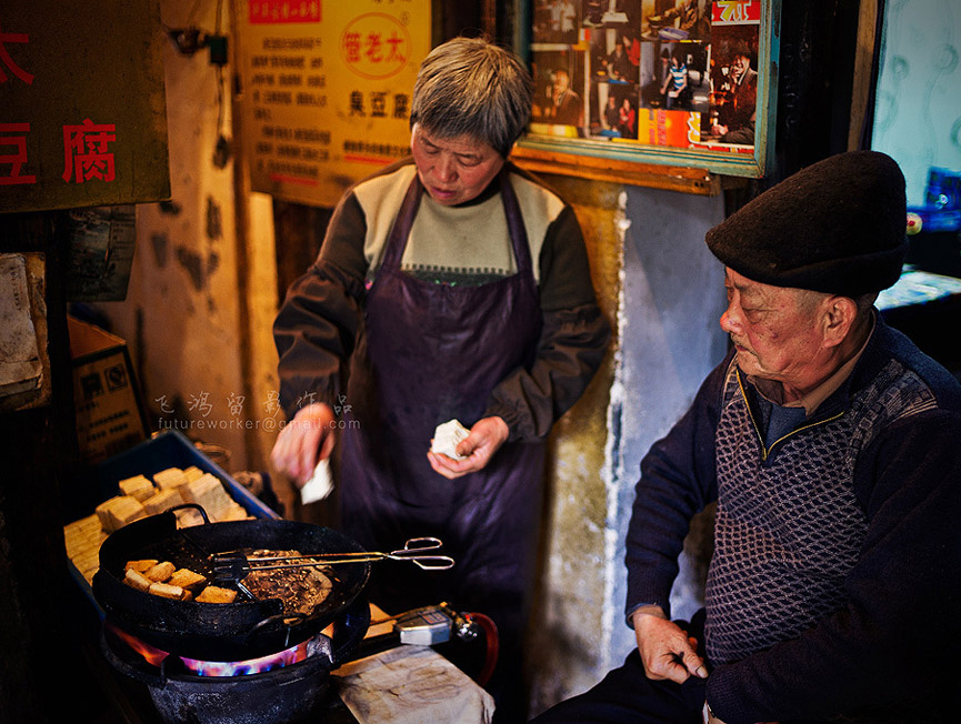 Puesto callejero de tofu. Xiaozhong Li
